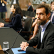 From the side, Dorsey looks more like a small-town pastor with his high collar.